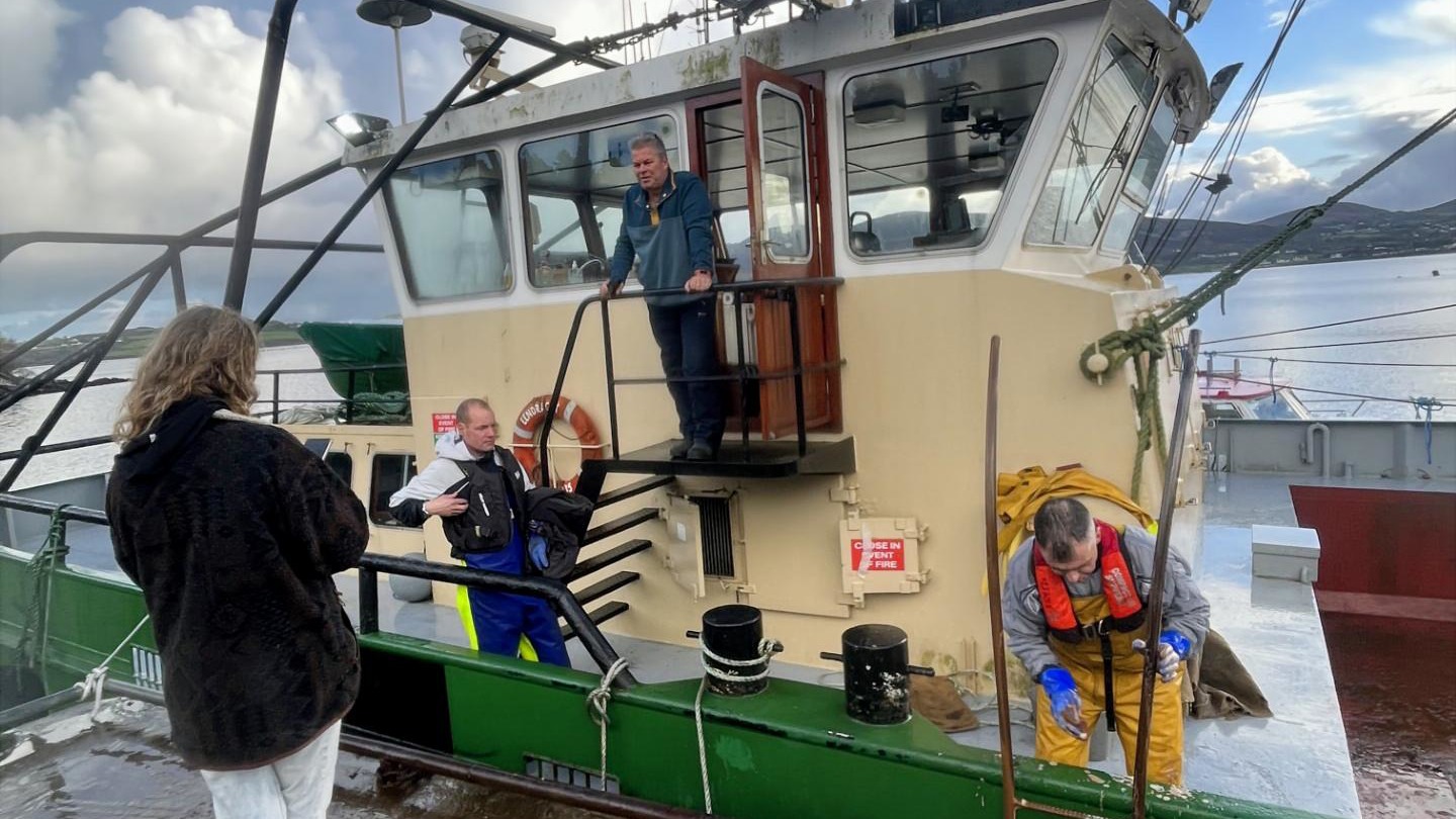 Fishing crew preparing vessel